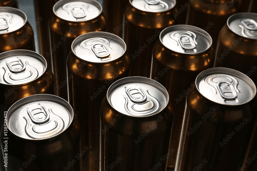 Cans of beer on table, closeup