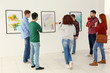 © Africa Studio - Young people in modern art gallery hall