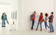© Africa Studio - Young people in modern art gallery hall