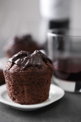 Sticker - Delicious chocolate muffin on grey table, close up