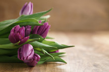 Bouquet Of Purple Tulips On Wood Table With Copy Space, Shallow Focus