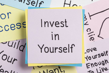 Wall Mural - Invest in Yourself written on a note