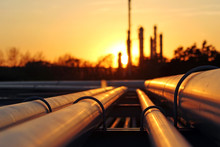 Crude Oil Refinery During Sunset With Pipeline Conection