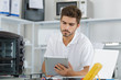 © auremar - attractive repairman concentrated at work