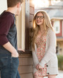 cute young blonde girl talking to a boy