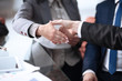 © Danuta - Business partnership meeting concept. Image businessmans handshake. Successful businessmen handshaking after good deal. Horizont