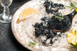 Black caviar in spoon