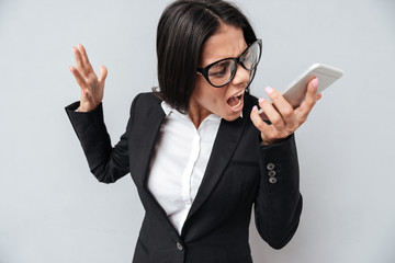 Sticker - Business woman screaming at smartphone