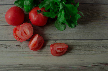 Appetizing fresh vegetables. Ripe tomatoes and fresh herbs. Healthy eating and diet. Natural and good for health.