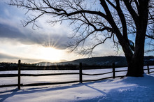Countryside Field In Virginia Covered In Snow During Winter With Sunset