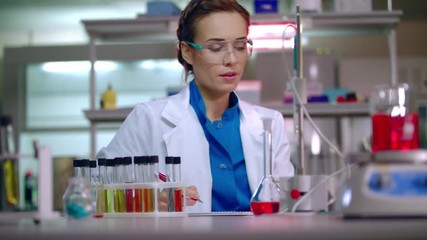 lab team in science laboratory. research team working in chemical laboratory. scientist team working