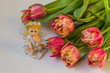 A bouquet of tulips and doll angel
