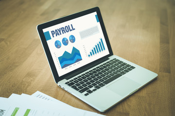 Wall Mural - Business Graphs and Charts Concept with PAYROLL word