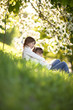 © natalialeb - Gentle sisters hug apple blossom, sunny childhood
