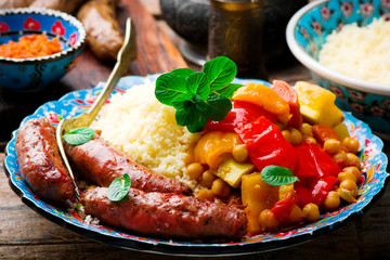 Wall Mural - Couscous and Merguez Sausages.selective focus