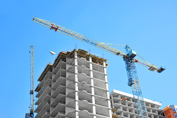 Wall Mural - Crane and highrise construction site