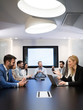 © NDABCREATIVITY - Business people conference in modern meeting room