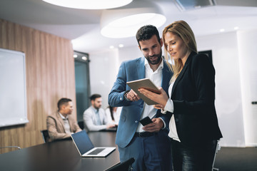 Wall Mural - Business colleagues having meeting in conference room