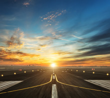 Airport Runway In The Evening Sunset Light