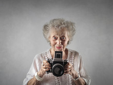 Elderly Lady Taking A Picture