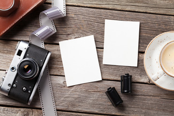 Vintage camera and blank photo frames