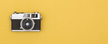 Retro Photography Camera On Colored Background