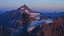 Sunset Scene In The Swiss Alps, Purple Mountains Fleckistock And Stucklistock.