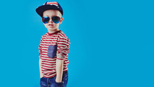 Cute Little Boy In Elegant Clothes And Sunglasses. Kids Fashion.