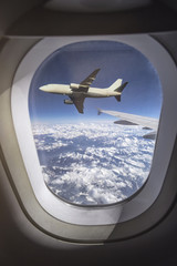 airplane outside an airplane window during flight