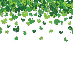 Wall Mural - Seamless pattern with shamrock clover falling leaves isolated on white background.