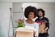 © .shock - multiethnic couple moving into a new home