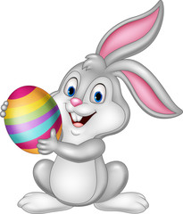 Wall Mural - Cartoon little bunny holding Easter egg