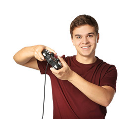 Wall Mural - Teenager playing videogame on white background