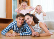 © JackF - Cheerful parents with two daughters