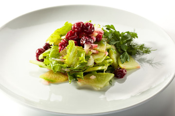 Wall Mural - Fresh Green Salad with Radish and Cherry Berries