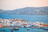 Fototapeta Mapy - View of traditional greek village with white houses on Mykonos Island, Greece,