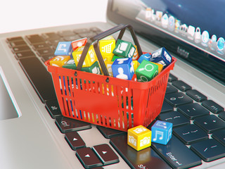 Leinwandbilder - Laptop computer application software icons in the shopping basket. Store of apps concept.