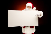 Santa Claus Pointing On Blank Card