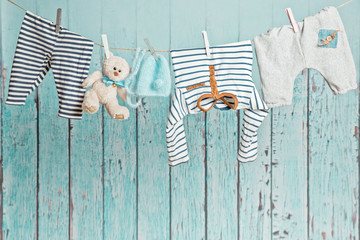 Baby clothes hanging on the clothesline