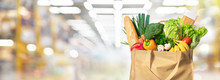 Eco Friendly Reusable Shopping Bag Filled With Vegetables On A Blur Background