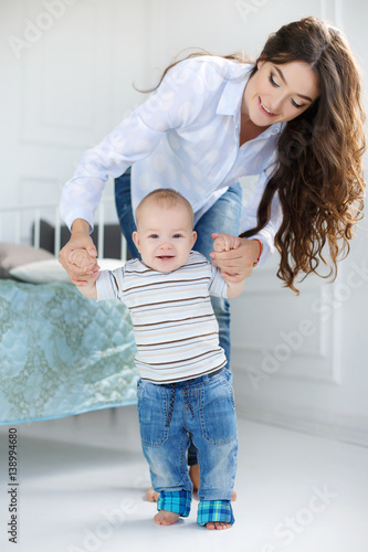 Slender Young Brunette Woman With Long Curly Hair Learn To Walk