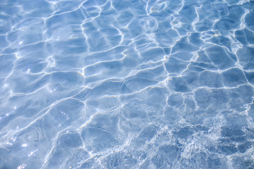 Close up of shallow sea with white sand