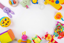 Colorful Baby Toys On White With Copy Space