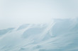 A beautiful, minimalist landscape of snowdrift in Norway. Clean, light, high key, decorative look.