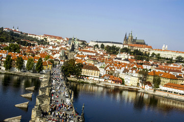 Wall Mural - Prague, city panoram, Carls Bridge, river Moldova, hill Hradschi