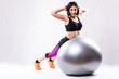 © dianagrytsku - one caucasian woman exercising fitness ball workout posture in isolated on white background