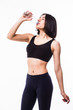 © dianagrytsku - young sport woman drinking water,