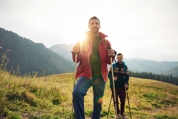 Wall Mural - Two hikers standing together in the great outdoors