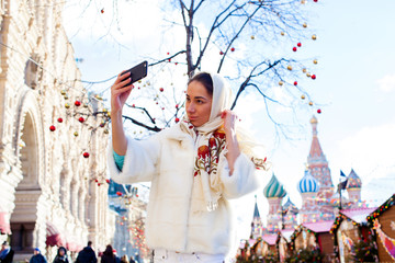 Poster - Selfie, Young beautiful girl photographed on a cell phone