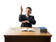 © atomfotolia - Young boy in a jacket and white shirt sitting at a writing desk with pen and book and keeps his hand extended upwards on a white background